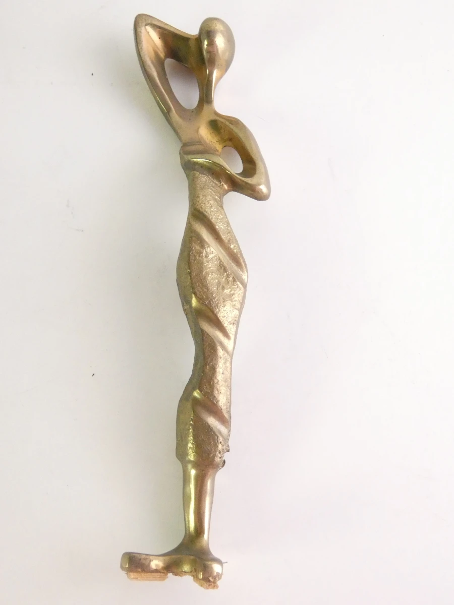Abstract, gestileerd vrouwenfiguur in messing