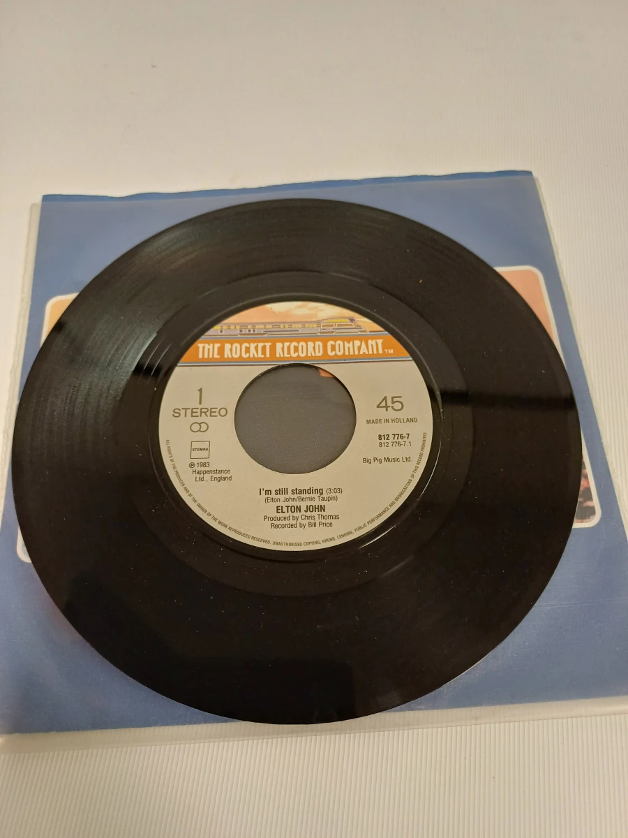 2 singles Elton John
