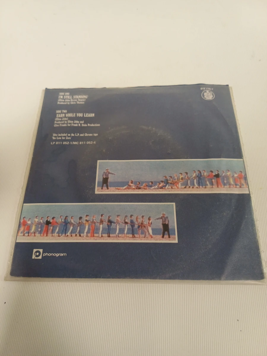 2 singles Elton John