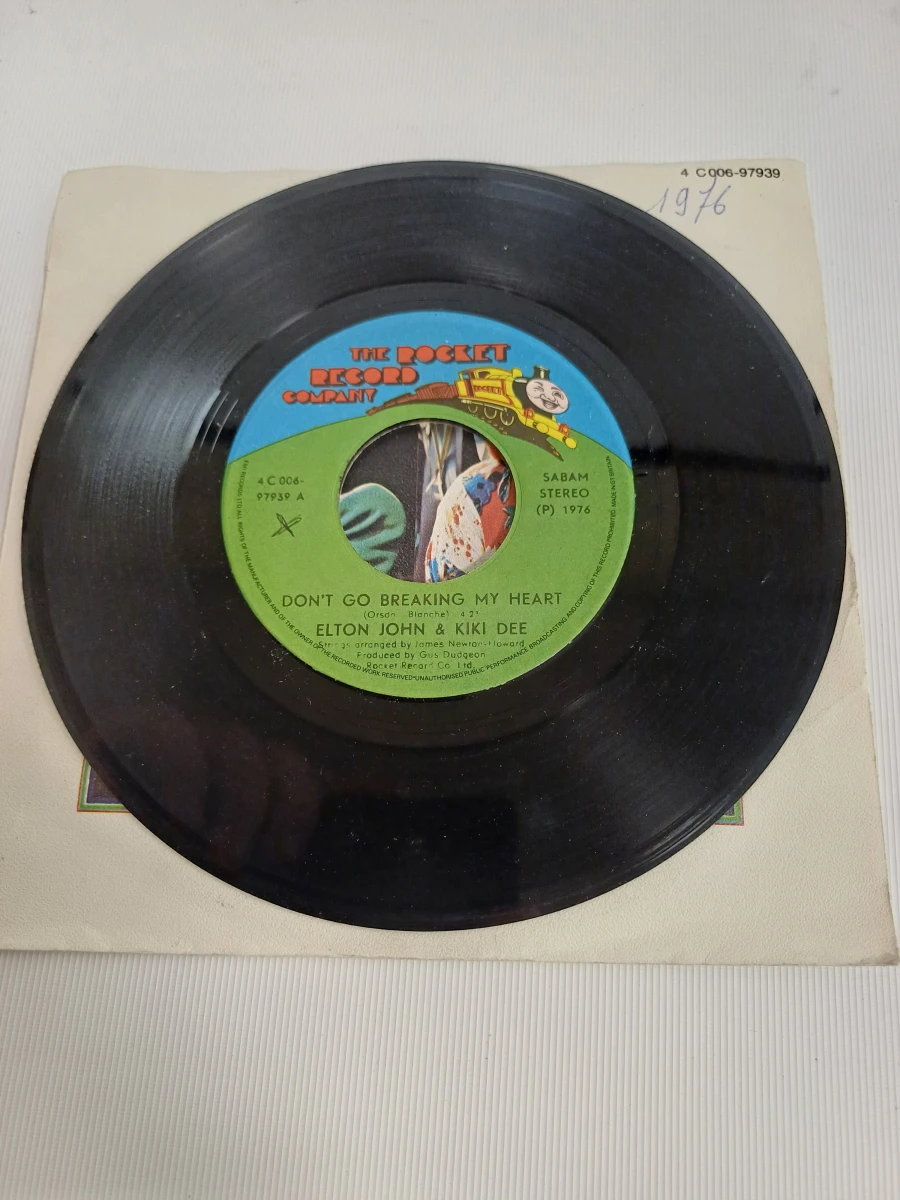 2 singles Elton John