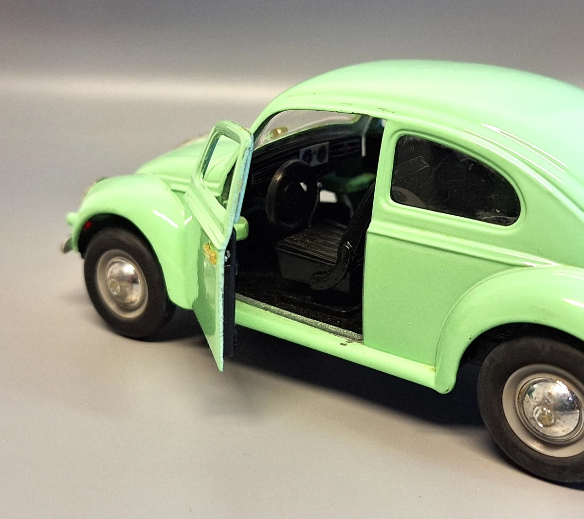 Mintgroene Volkswagen Kever