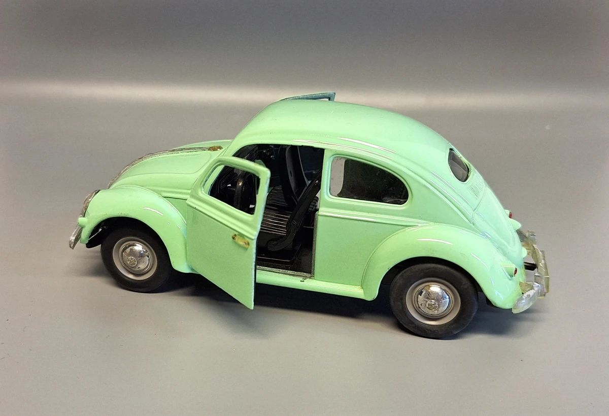 Mintgroene Volkswagen Kever