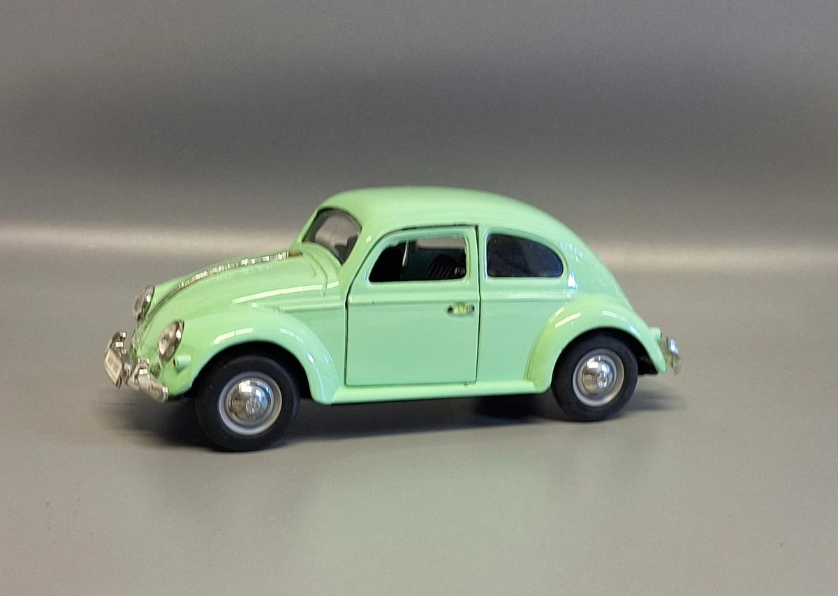 Mintgroene Volkswagen Kever