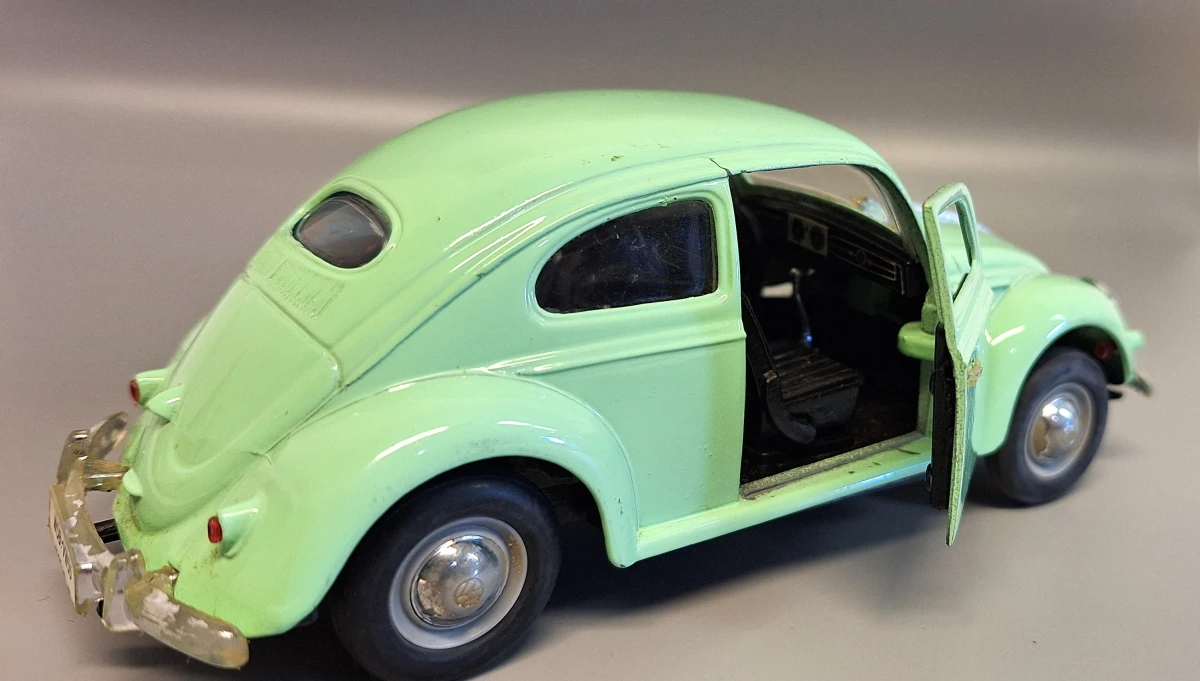 Mintgroene Volkswagen Kever