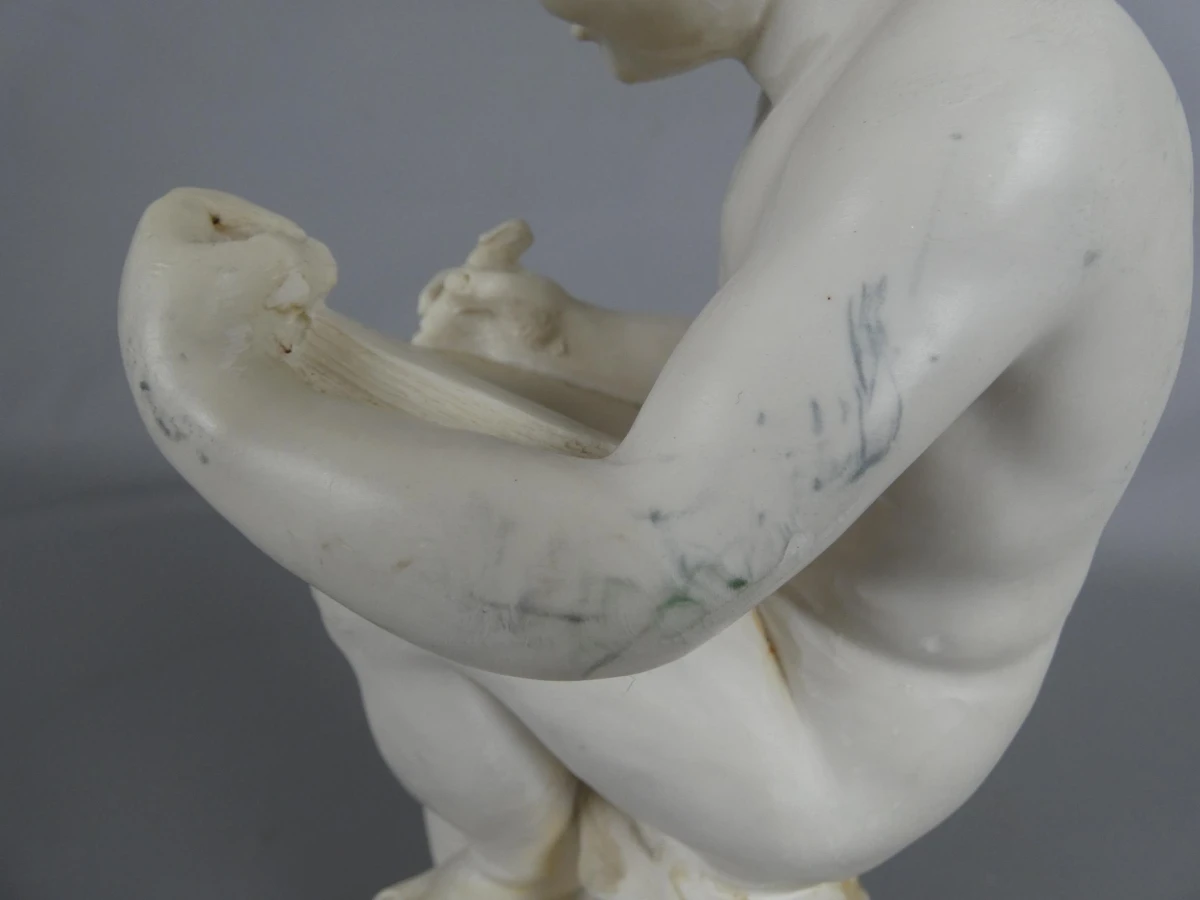 Italiaans Kunsthars Beeldje van een Schrijvende jonge