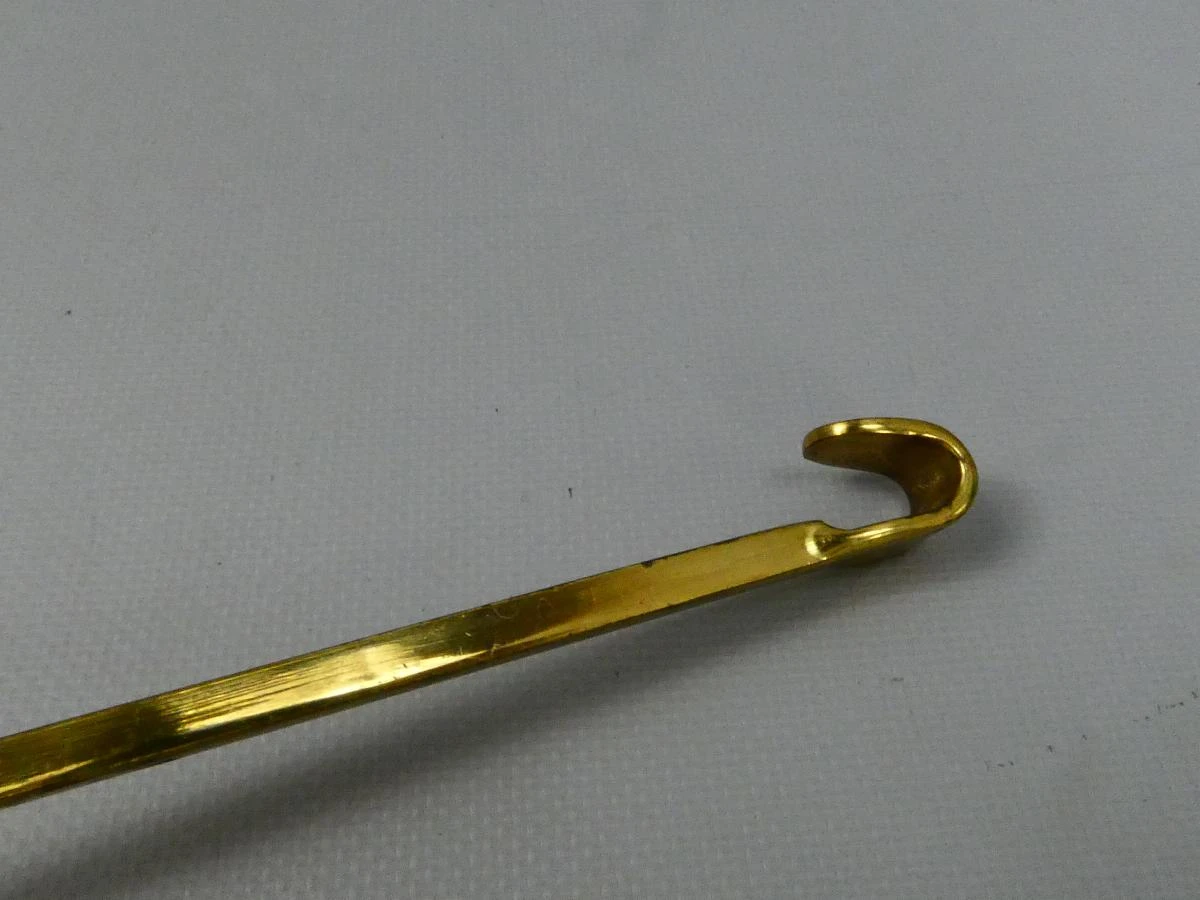 Vintage koperen schuimspaan met messing geklonken handvat