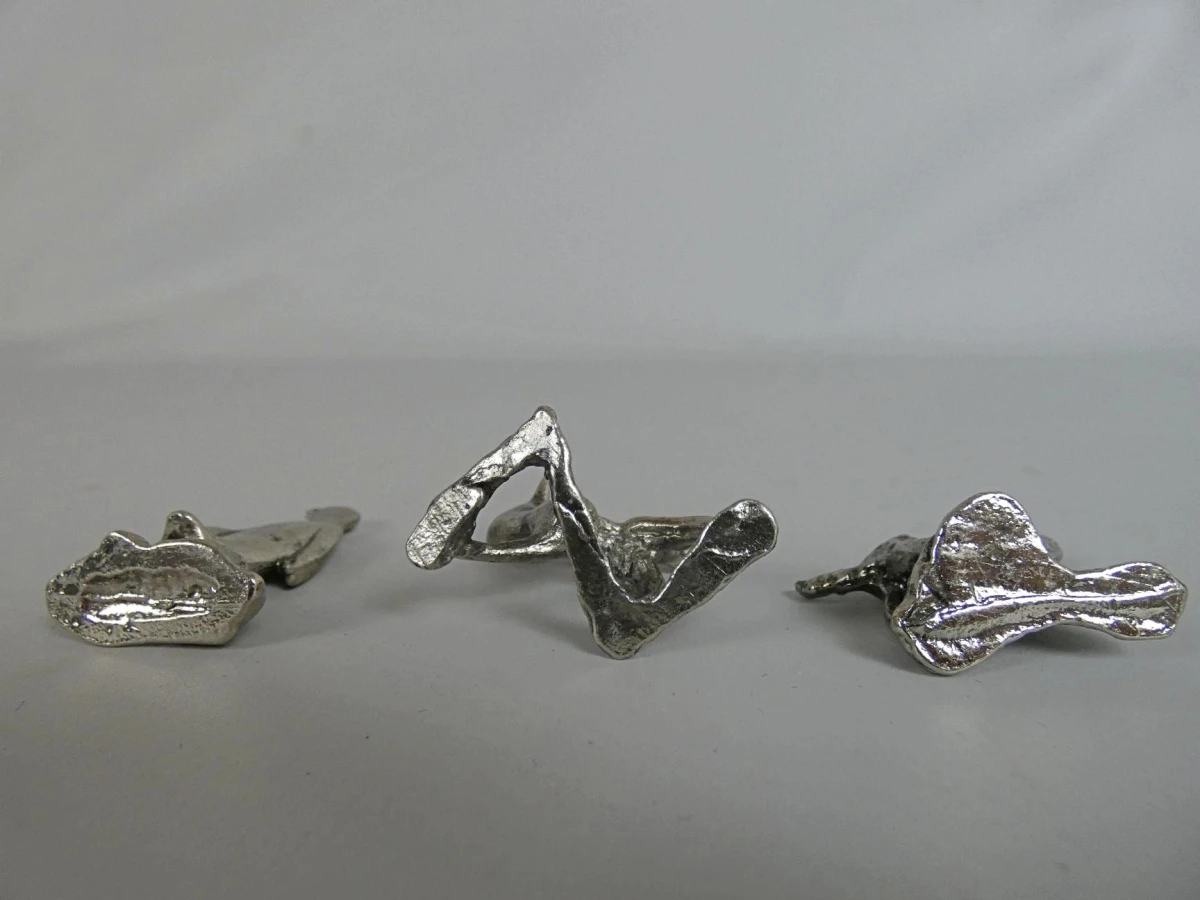 Set van drie metalen dierenfiguren