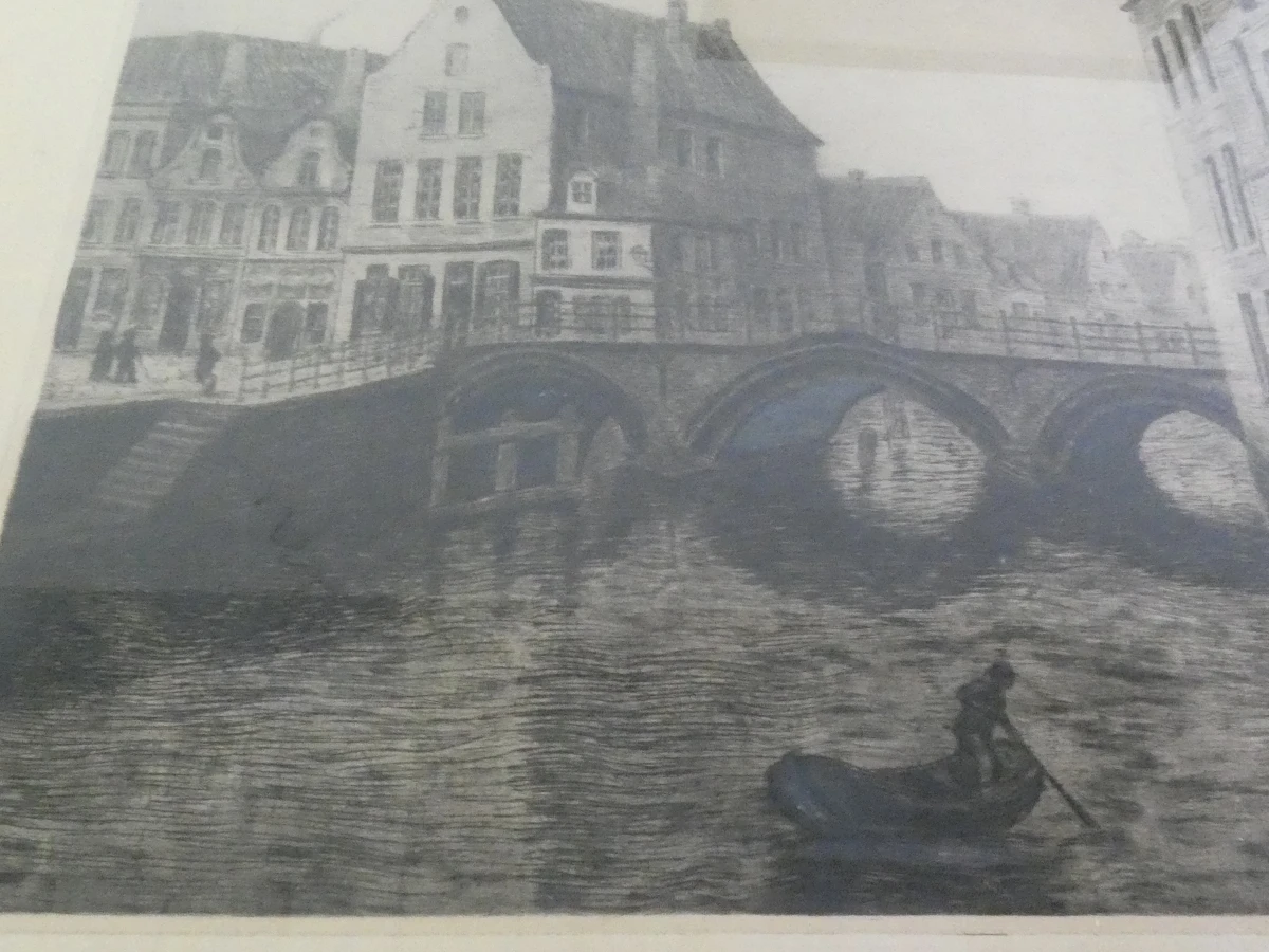 Lot van drie ingelijste etsen met historische stadsgezichten