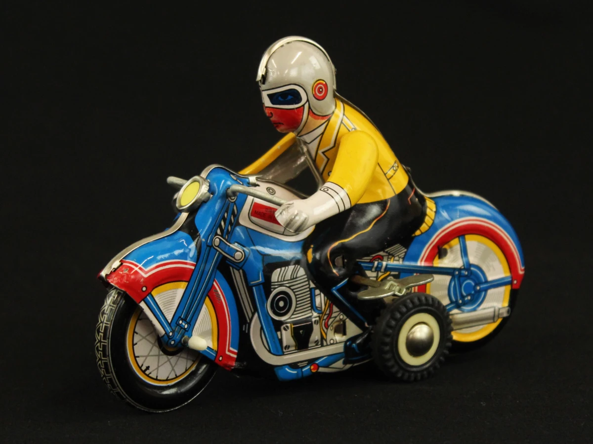 4 vintage blikken motorfietsen met opwindsysteem