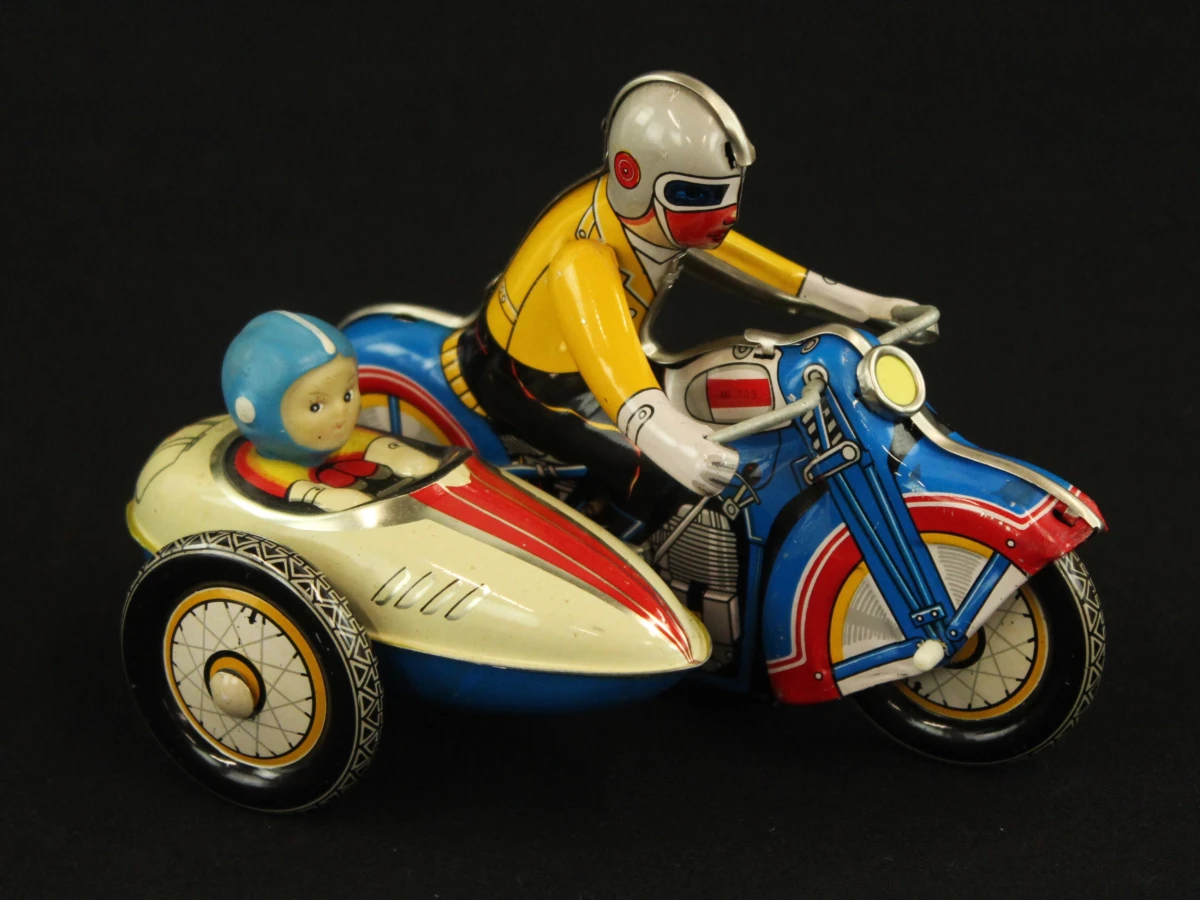 4 vintage blikken motorfietsen met opwindsysteem