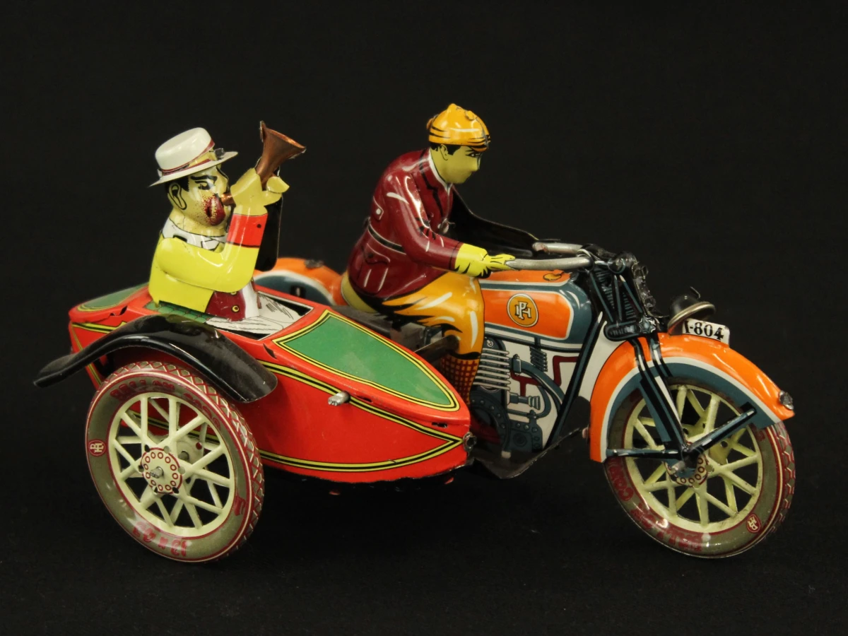 4 vintage blikken motorfietsen met opwindsysteem