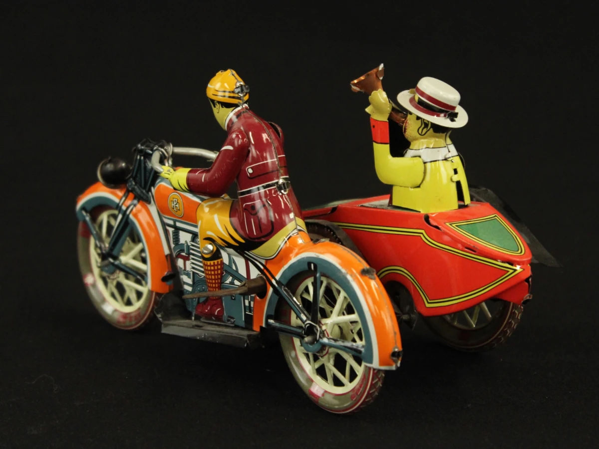 4 vintage blikken motorfietsen met opwindsysteem