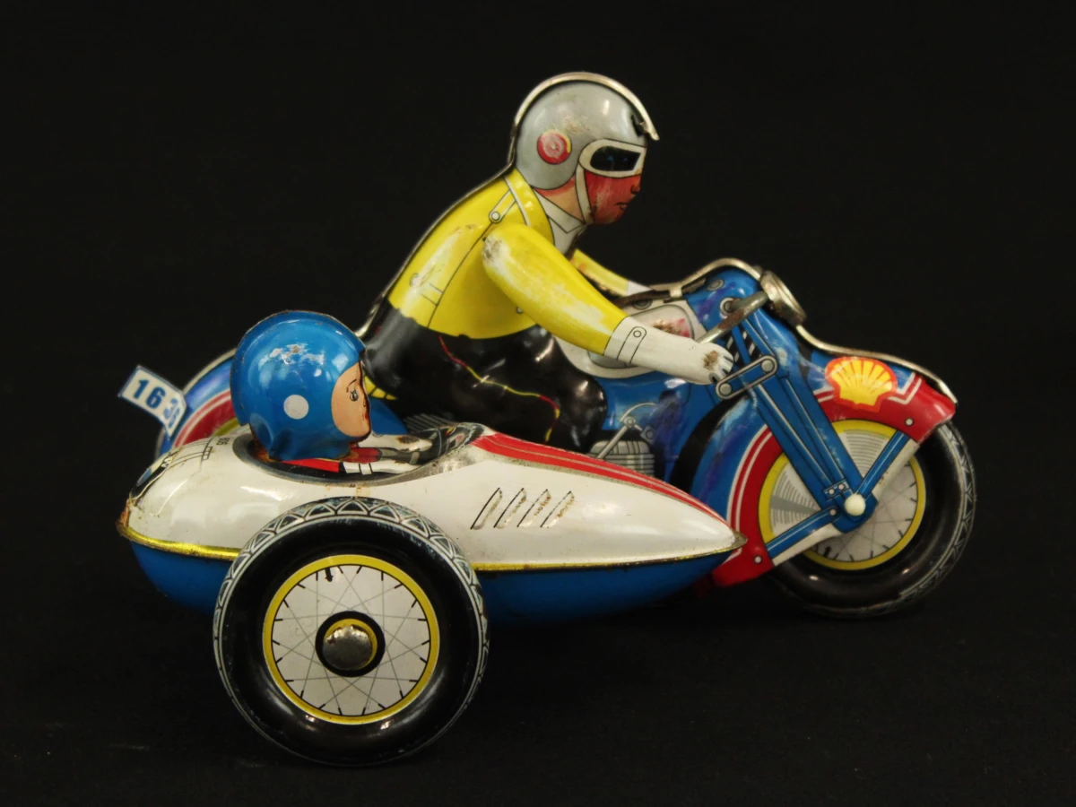 4 vintage blikken motorfietsen met opwindsysteem