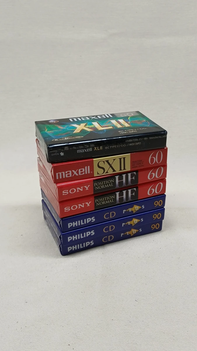 Set van 7 audio cassettebandjes van verschillende merken