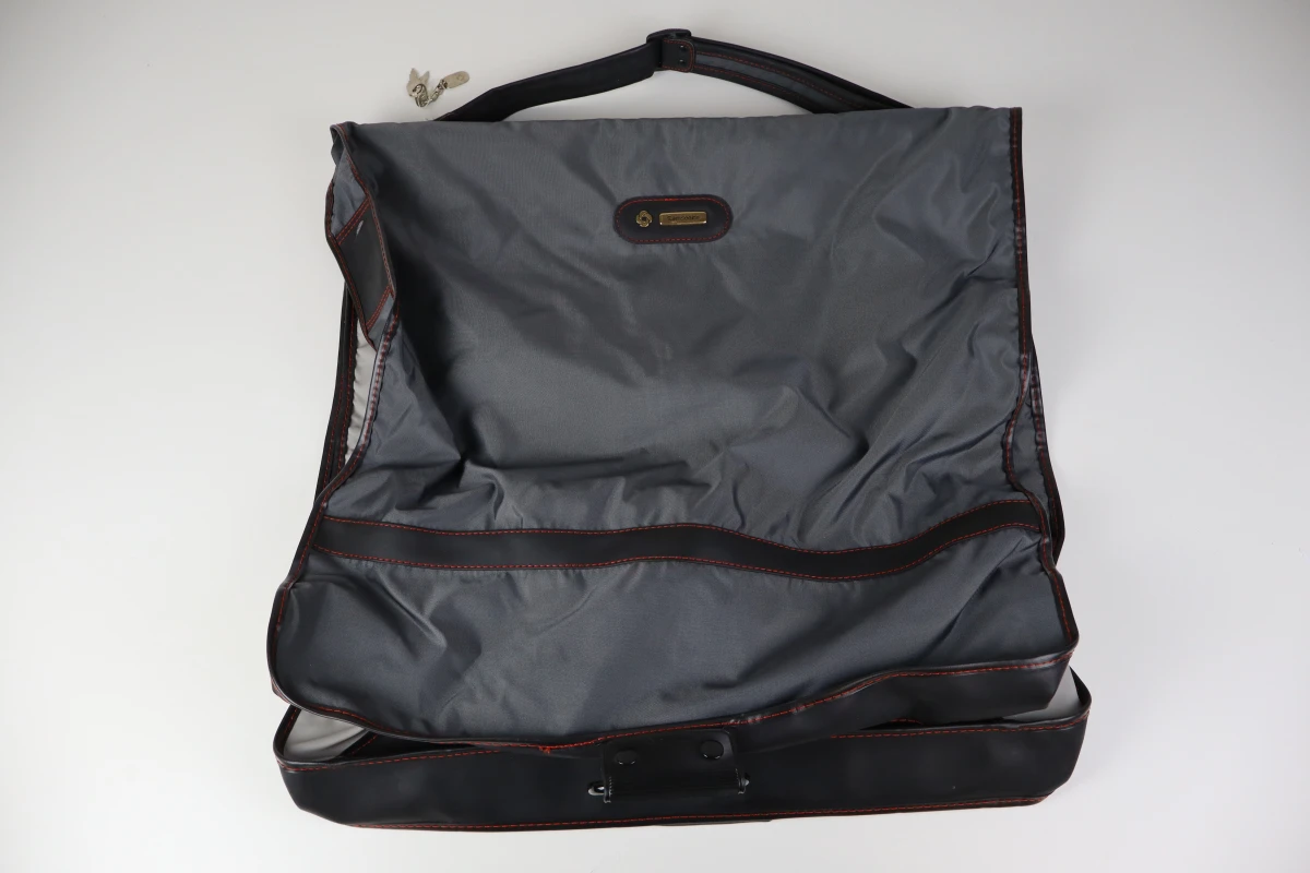 Samsonite kledinghoes met hangers en slot