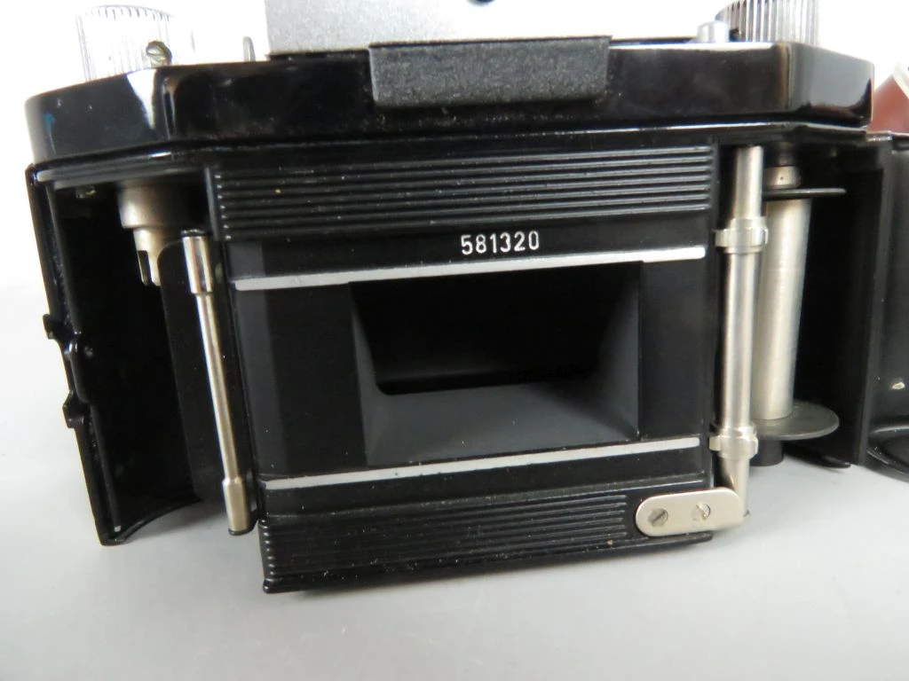 Vintage Exa camera met leren hoes