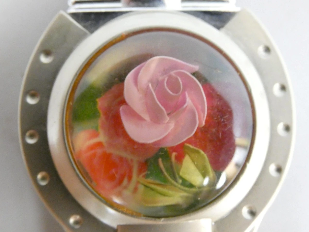 Vintage aansteker met rozendecoratie