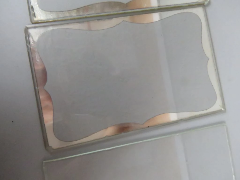 Set van 2 vintage fotolijstjes met metalen standaard