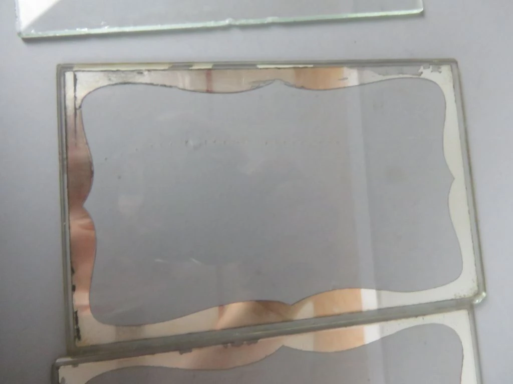 Set van 2 vintage fotolijstjes met metalen standaard
