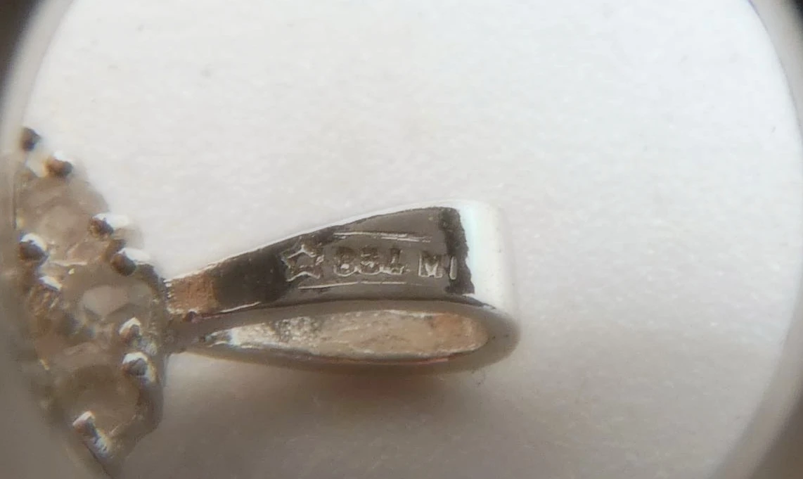 Zilveren sleutel hanger