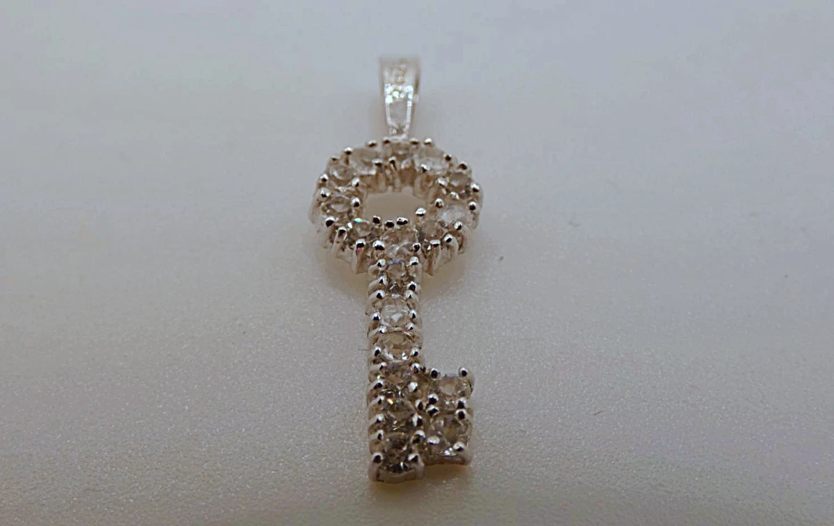 Zilveren sleutel hanger