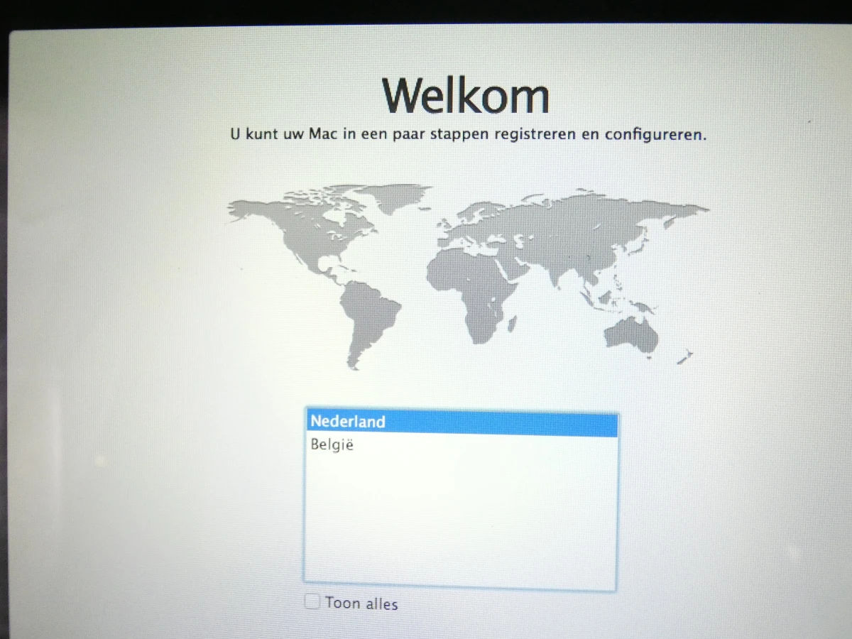 MacBook Air met lader en beschermhoes