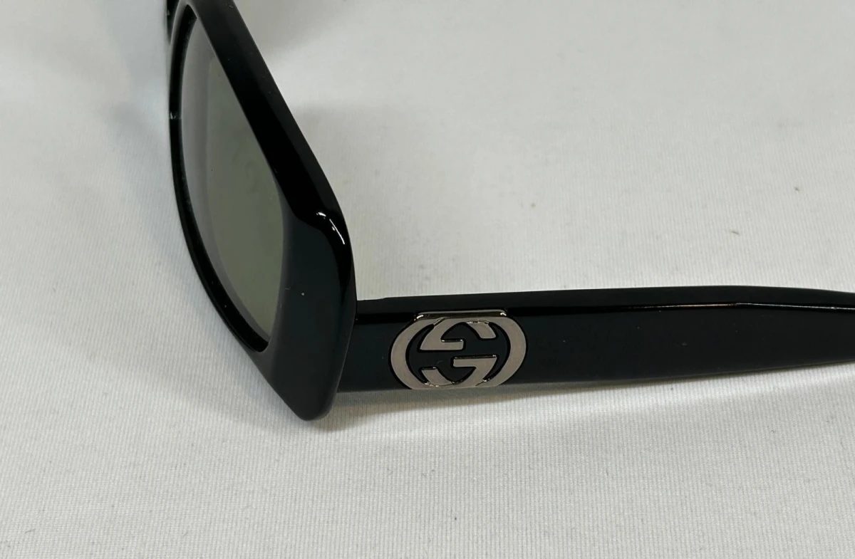 Zwarte Gucci zonnebril met etui