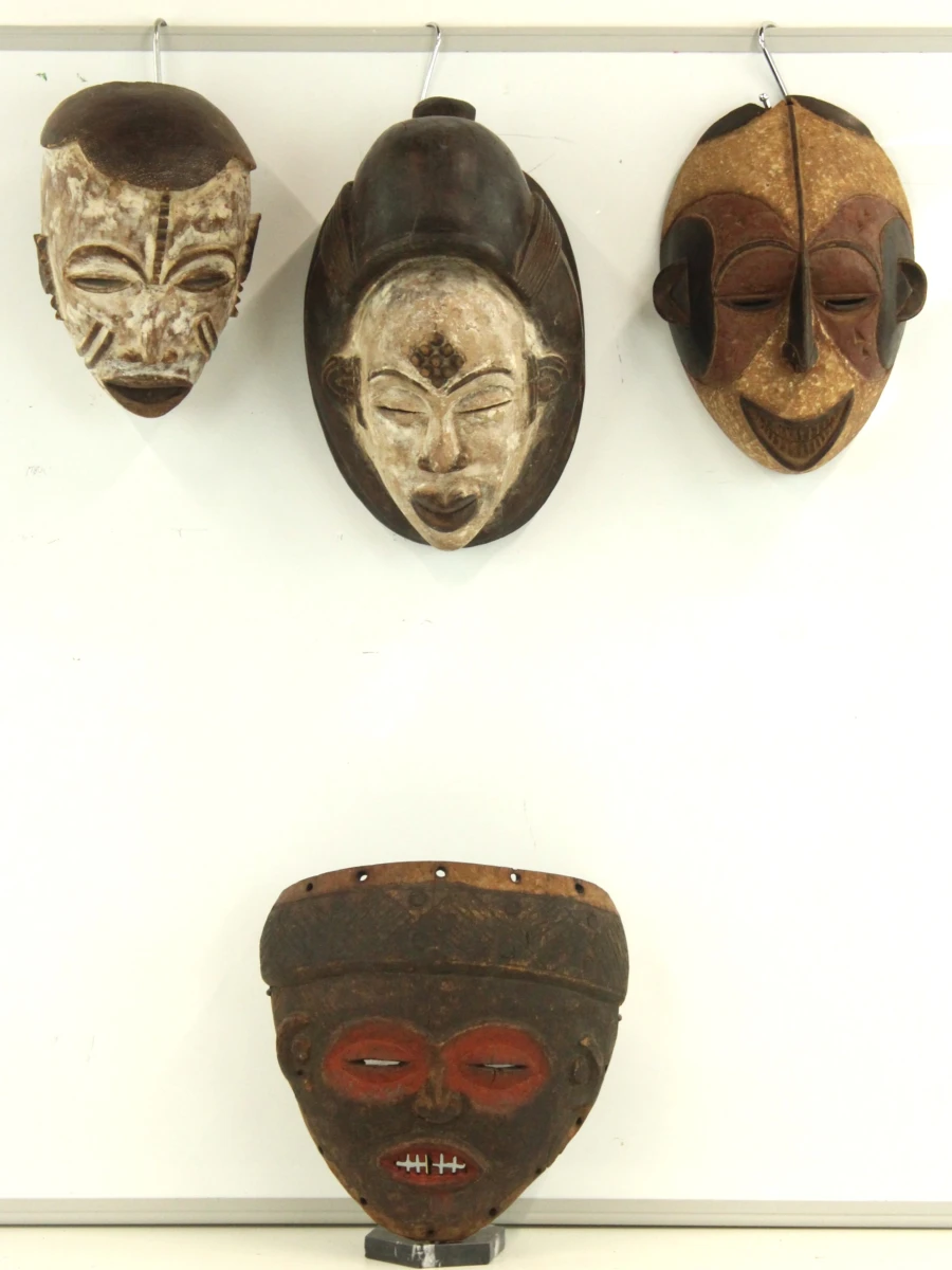 Set van 4 handgesneden Afrikaanse houten maskers – diverse tribale stijlen