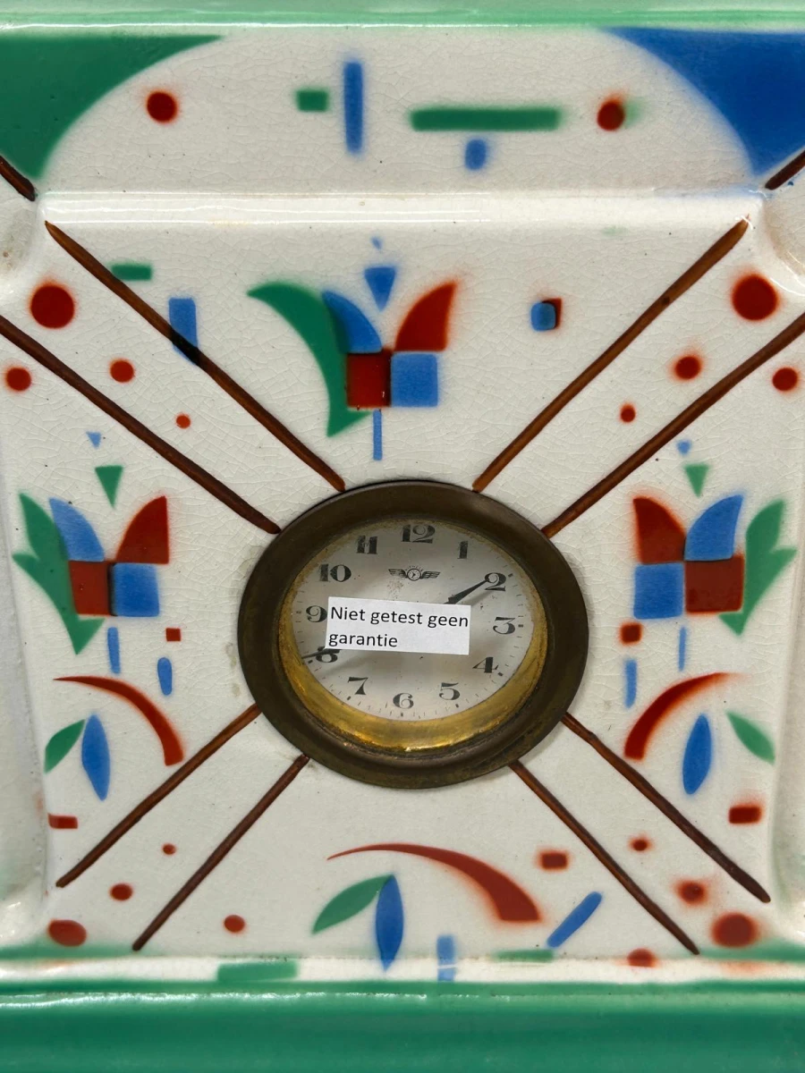 Art Deco keramische klok met twee vazen garnituur