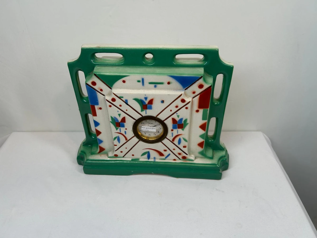 Art Deco keramische klok met twee vazen garnituur