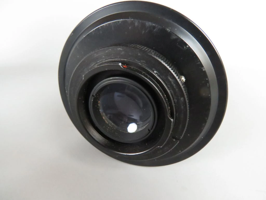 Vintage camera lens met filters en draagtas