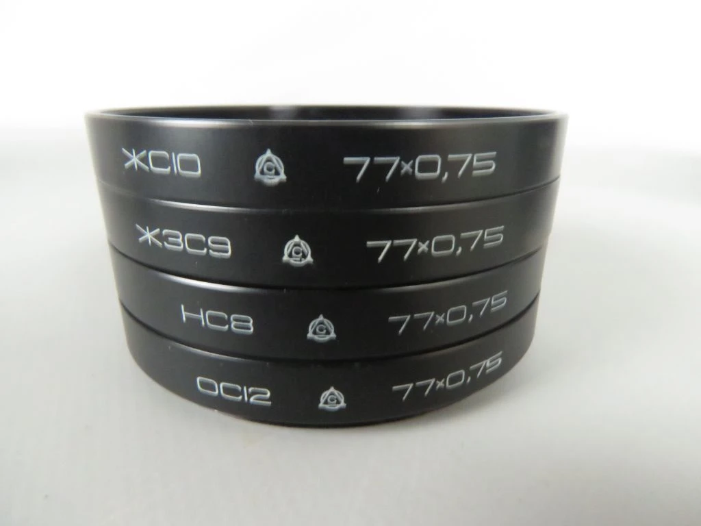 Vintage camera lens met filters en draagtas