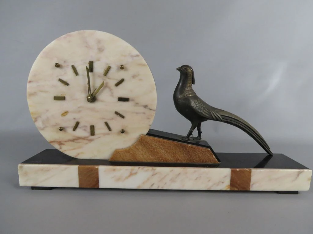 Art deco marmeren klok met vogelbeeld