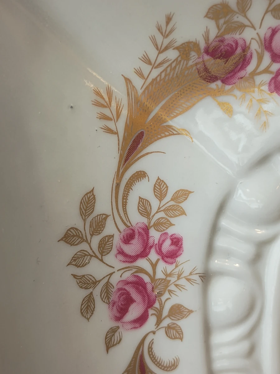 Vintage spiegel met keramische bloemenrand
