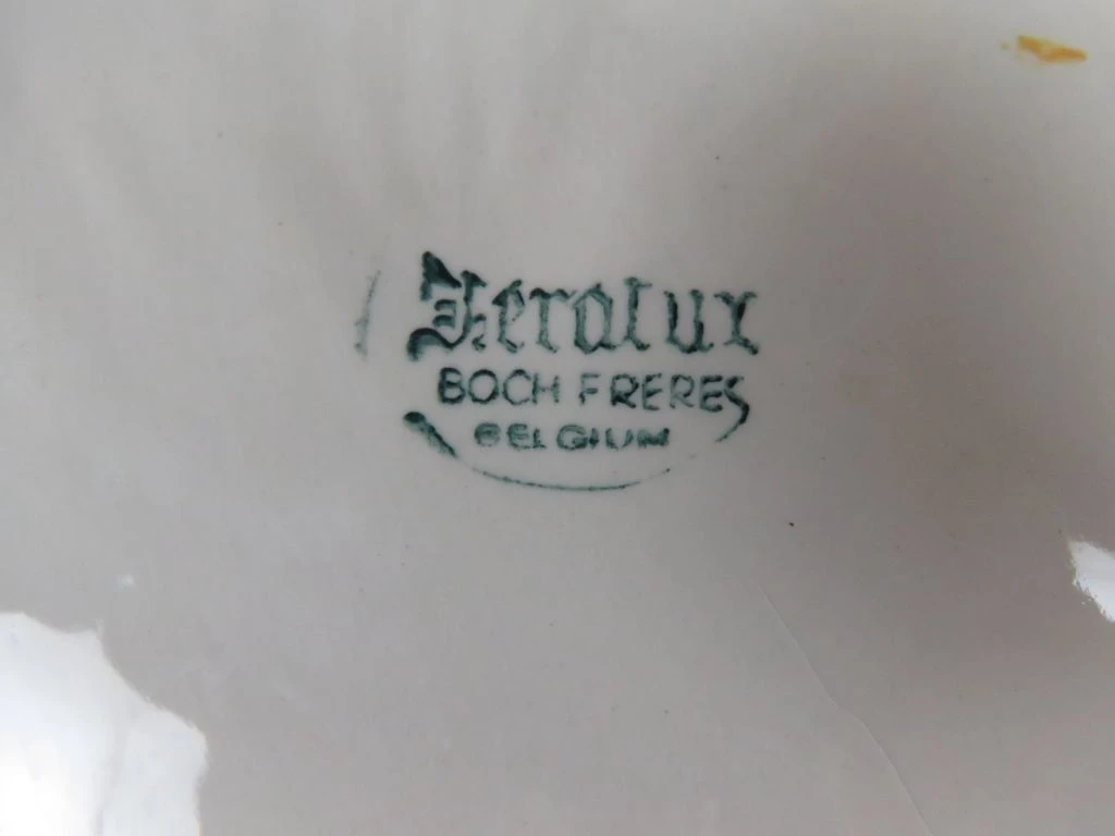 Decoratief porseleinen dienblad met bloemenmotief en gouden rand