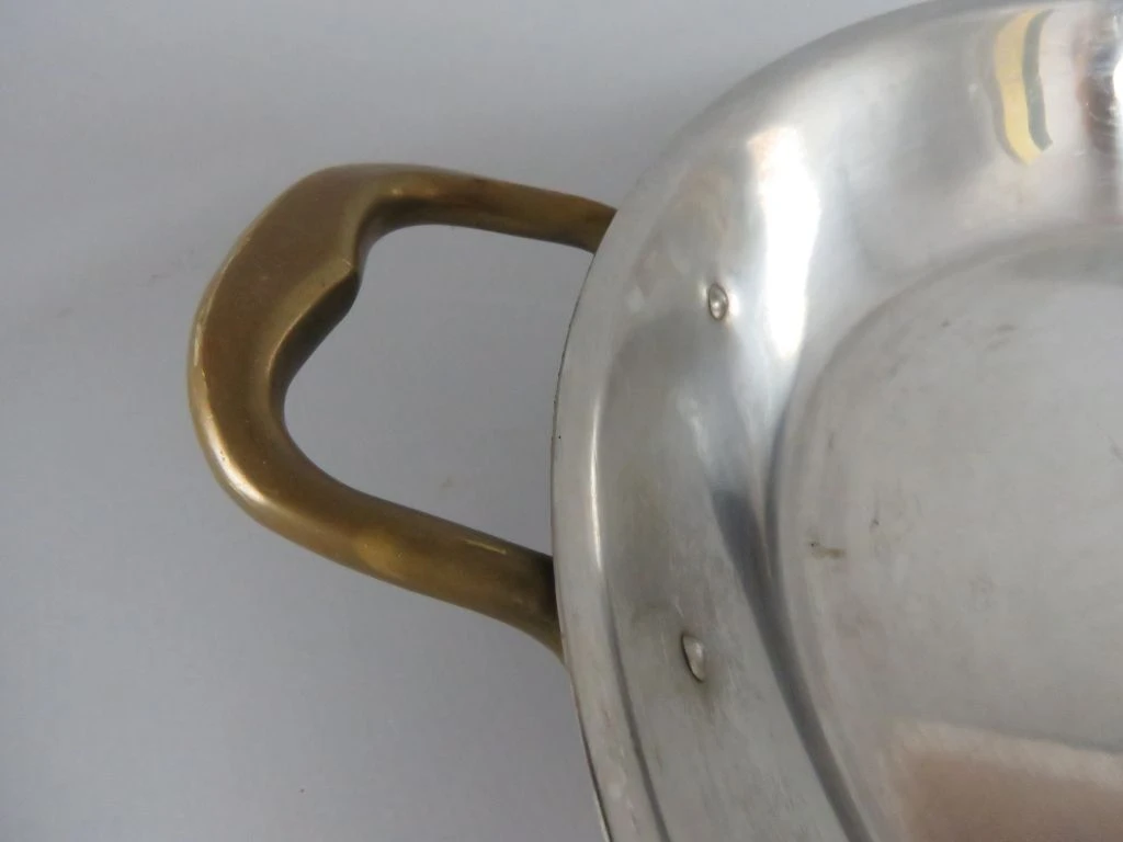 Koperen pan met handvatten