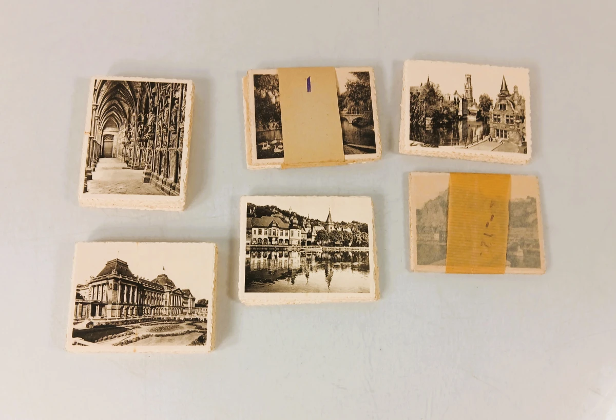 Set oude zwart-wit kunstfoto's 'Ken Uw Land' in envelop