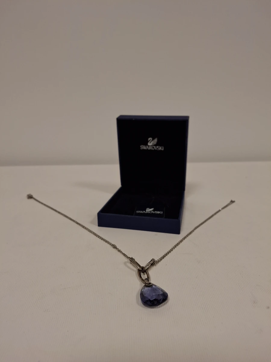 Swarovski ketting met blauwe steen en certificaat