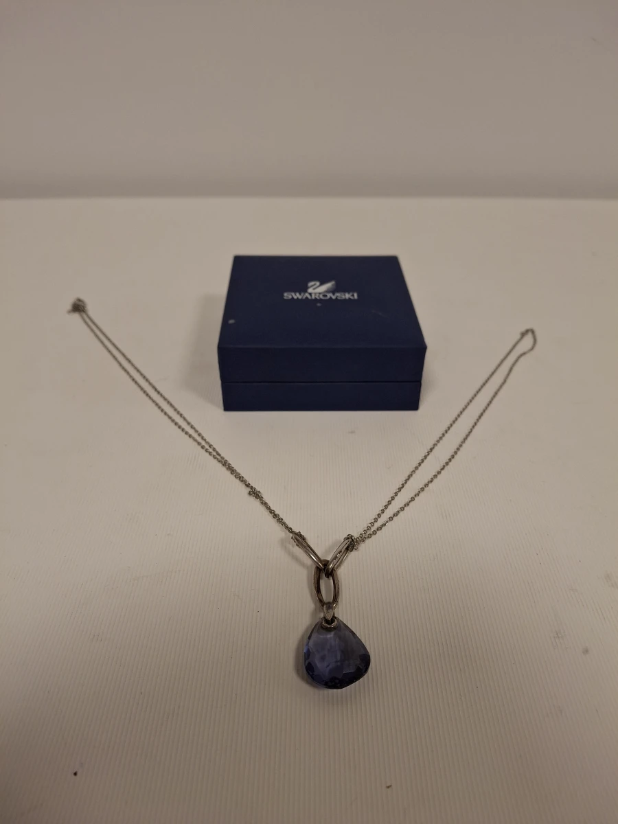 Swarovski ketting met blauwe steen en certificaat