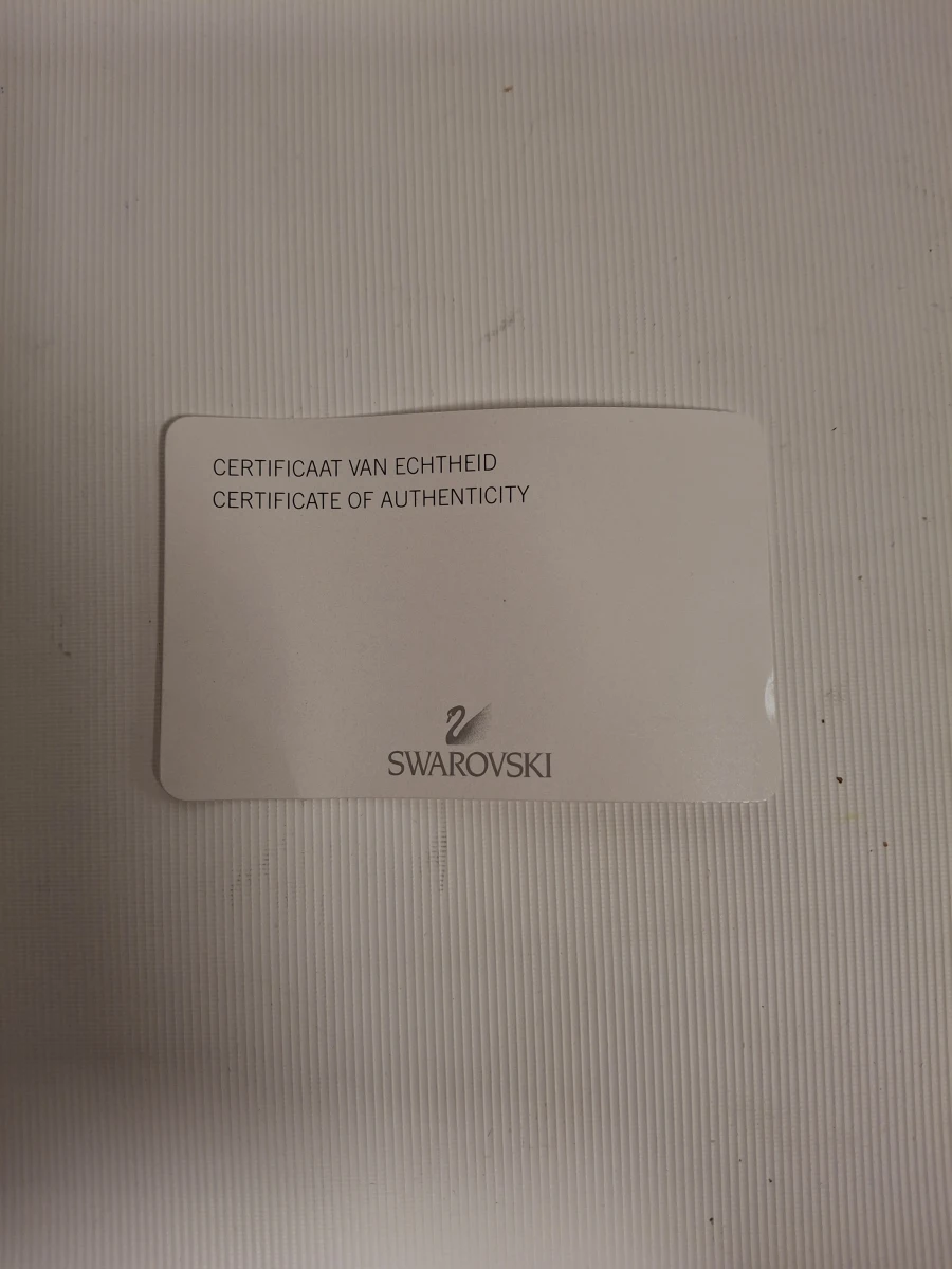 Swarovski ketting met blauwe steen en certificaat
