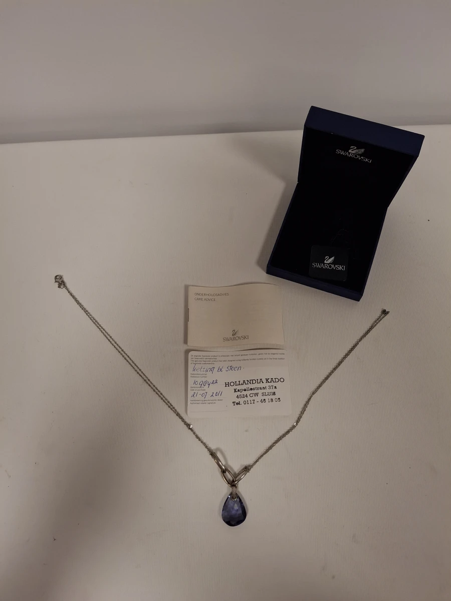 Swarovski ketting met blauwe steen en certificaat