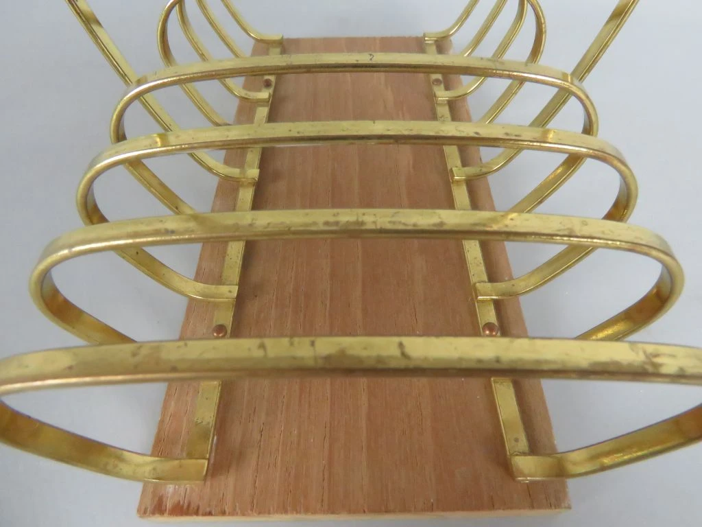 Vintage broodhouder van hout en messing