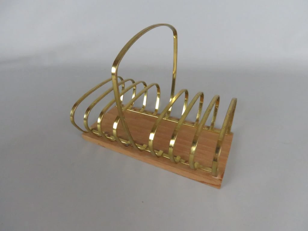 Vintage broodhouder van hout en messing