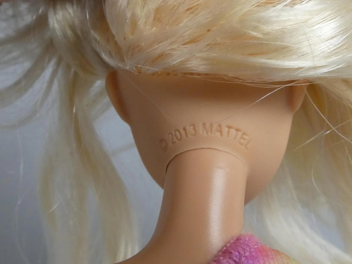 drie Mattel speelgoedpoppen
