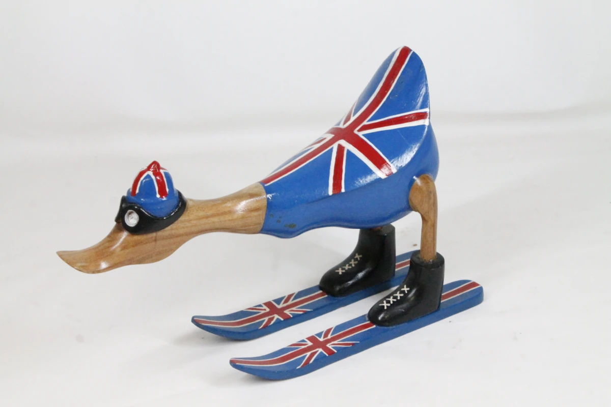 Handgemaakte houten eend op ski's