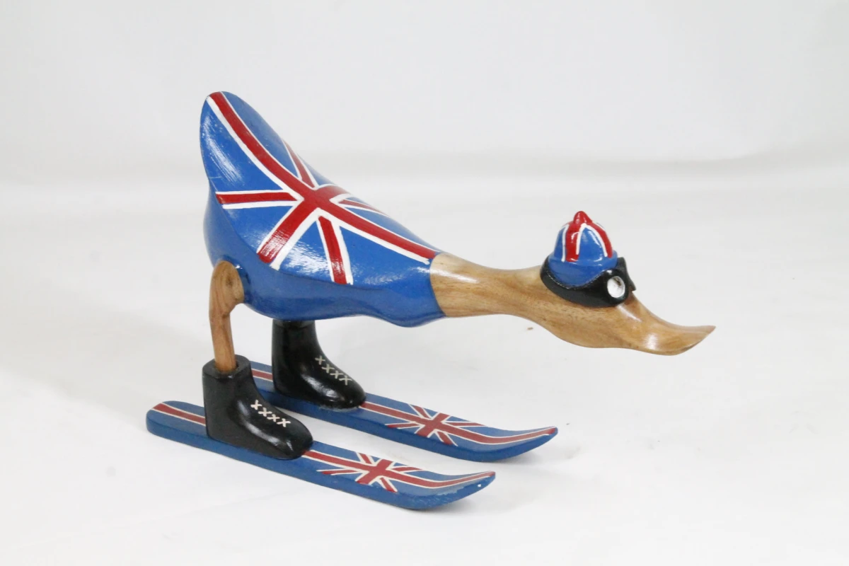 Handgemaakte houten eend op ski's
