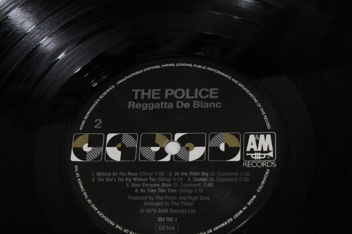 2 LP's: The Police - Every Breath You Take (The Singles) en Regatta de blanc