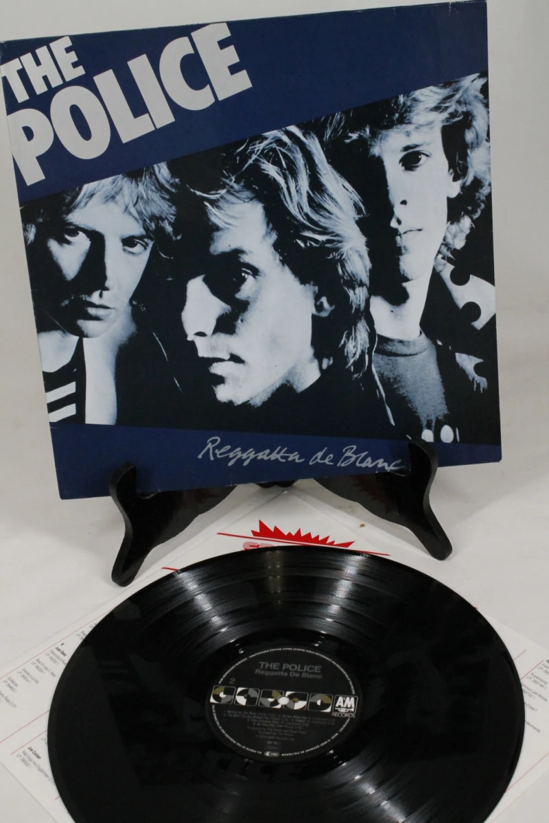 2 LP's: The Police - Every Breath You Take (The Singles) en Regatta de blanc