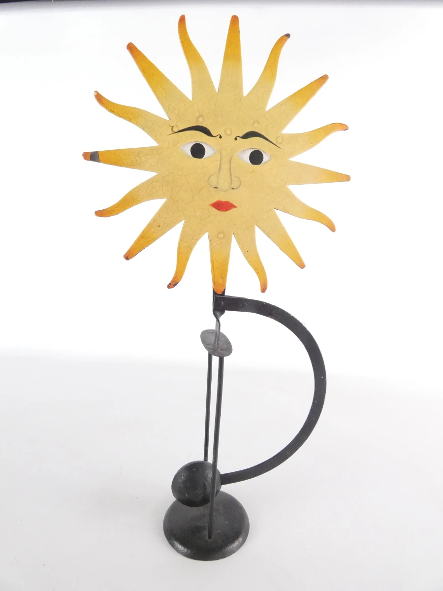 Decoratief metalen zonnesculptuur met gezicht - Counterweight toy