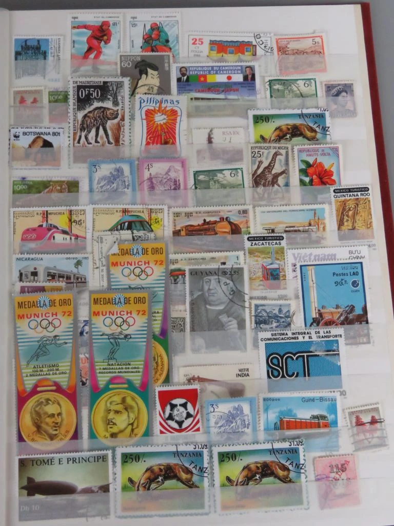 Postzegelverzameling in album met Belgische en vele andere postzegels